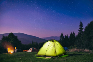 Tent under night sky