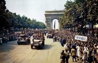 Crowds of French people line the Champs Élysées - 26 August 1944.