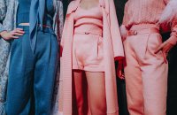 Three woman wearing designer fashion