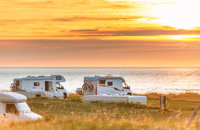 Motorhomes at sunset