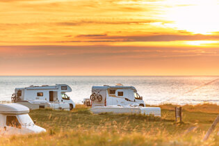 Motorhomes at sunset