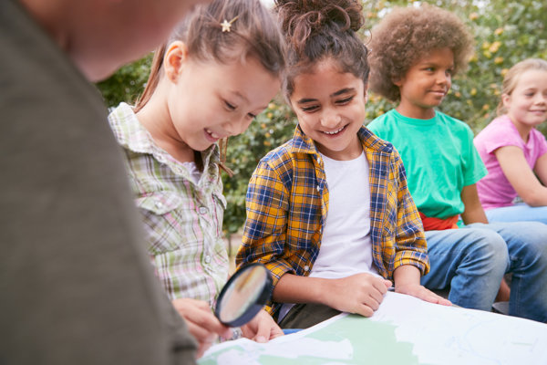 Group Of Children On Outdoor Activity Camping Trip
