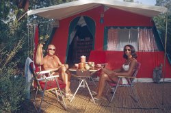 A couple enjoys their camping holiday over a cup of coffee on the Côte d'Azur in 1970