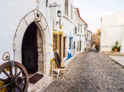 Calcada da Frandina street leading to the Porta do Sol (Sun Door) in the Old Town of Estremoz in Portugal.