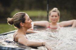 women in a hot tub