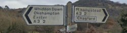 A Devon Road Sign with a Blue Block