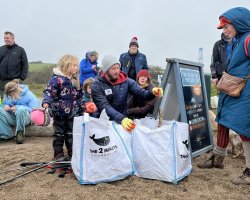 Beach cleaners in action
