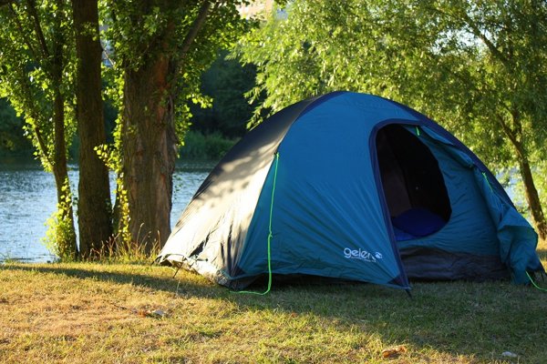 Tent on riverbank