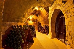 Dark wine cellars of Taittinger underneath the French city of Reims