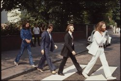 A behind the scenes photo, taken by Linda McCartney during the Abbey Road album cover photo shoot