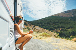 Woman in motorhome on roadside